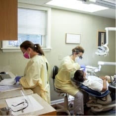 Cherry hill team member and dentist working