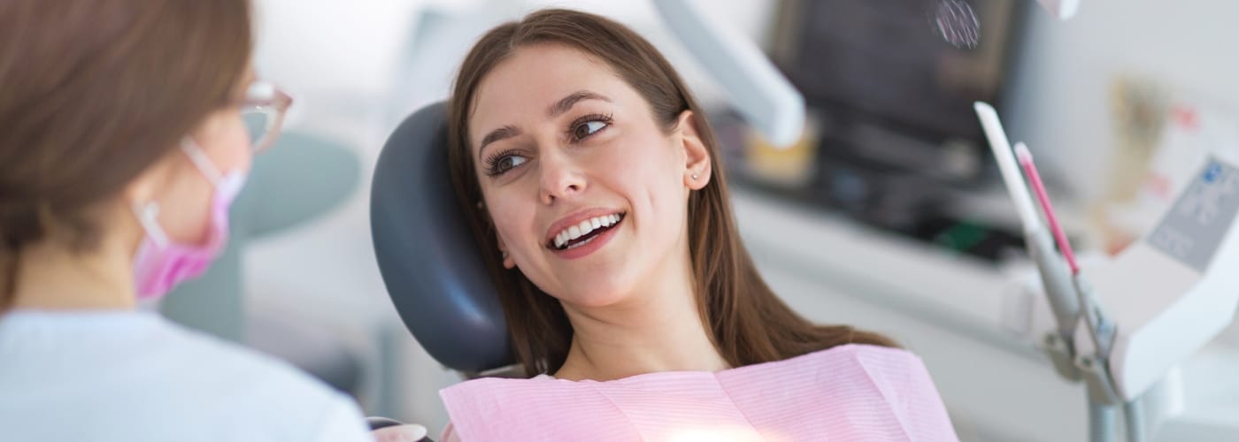 woman smiling at dentist