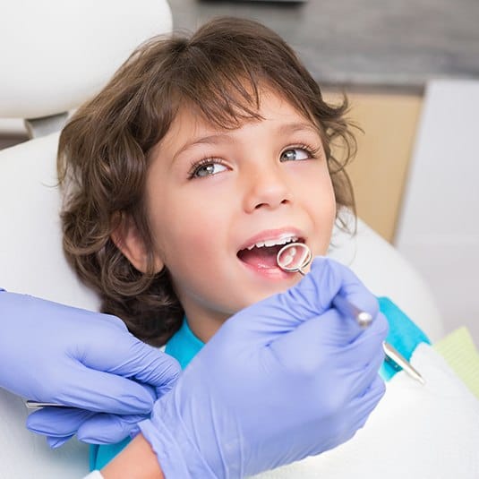 little boy getting a checkup