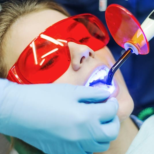 woman getting cosmetic bonding