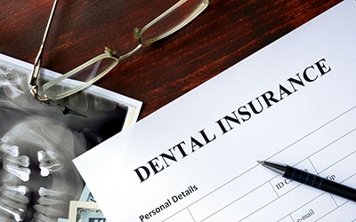 Dental insurance form on a table