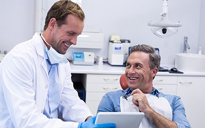 Man at dentist for dental implants in Cherry Hill