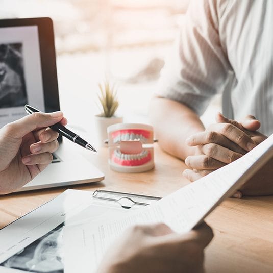 two people going over paperwork