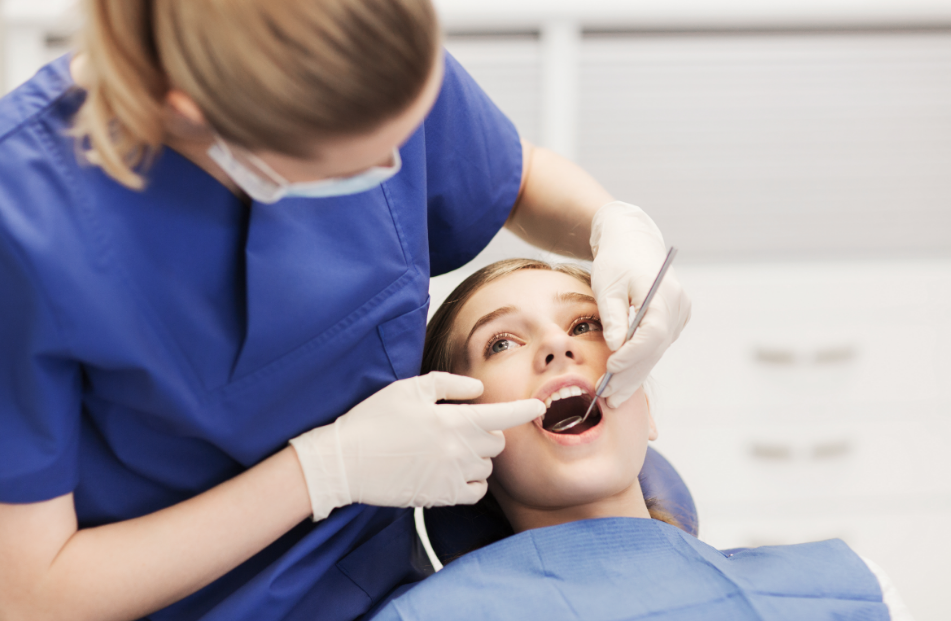 Teen undergoing dental exam